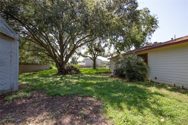 view of yard featuring fence