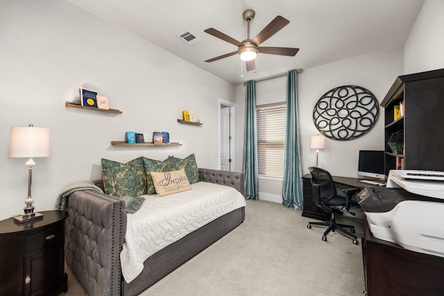 bedroom with light carpet, baseboards, visible vents, and a ceiling fan