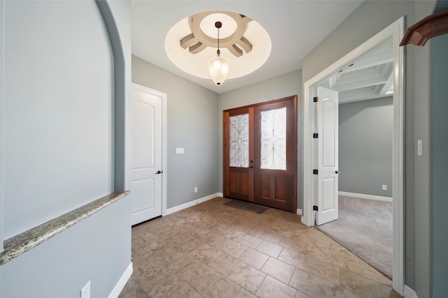 carpeted entryway featuring french doors