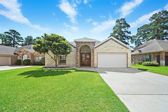 view of front of home featuring a garage and a front lawn