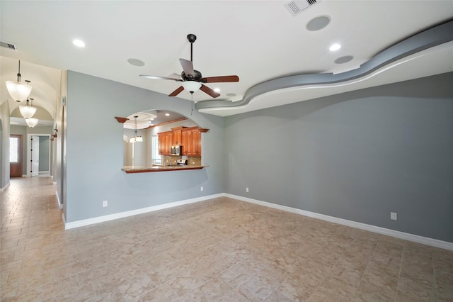 spare room featuring ceiling fan