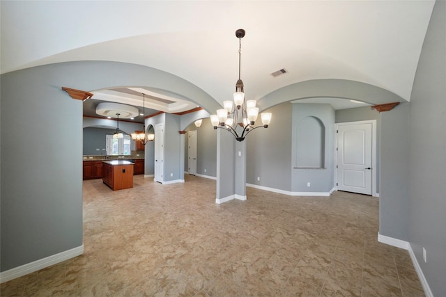 unfurnished dining area with a chandelier