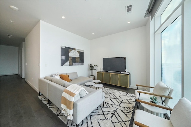 living room featuring dark hardwood / wood-style floors