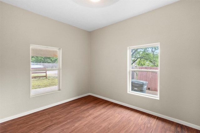 empty room featuring hardwood / wood-style floors