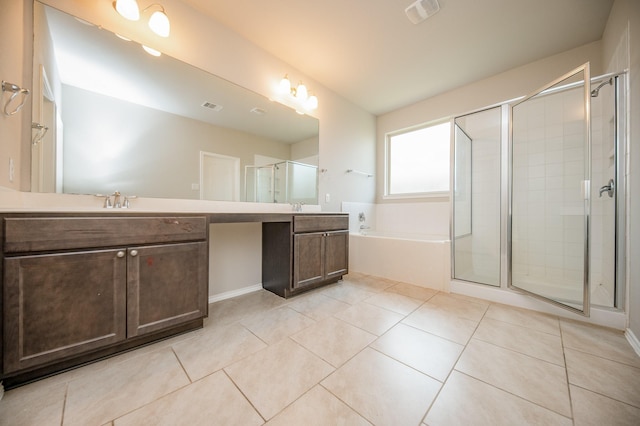 bathroom with tile patterned flooring, vanity, and plus walk in shower