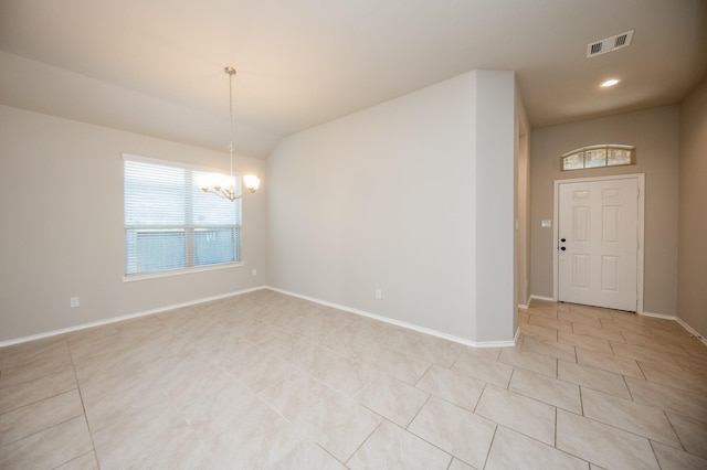 unfurnished room featuring light tile patterned floors and an inviting chandelier