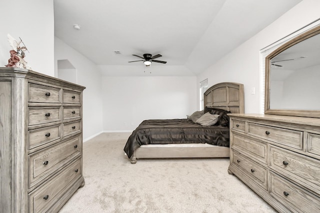 bedroom featuring ceiling fan and light carpet