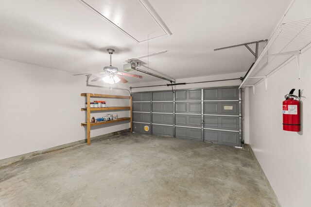 167 Hay Meadow Rd, Cedar Creek, TX 78612 - garage featuring a garage door opener and a ceiling fan