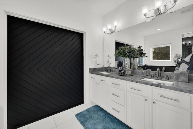 bathroom with vanity and tile patterned floors