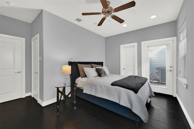 bedroom featuring ceiling fan and dark hardwood / wood-style flooring