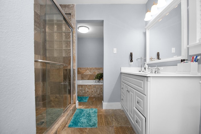 bathroom with vanity, shower with separate bathtub, and tile patterned floors