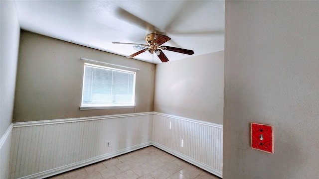 spare room featuring ceiling fan