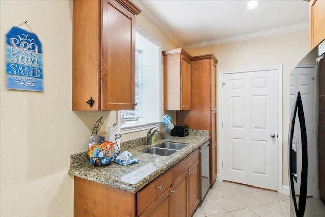 kitchen with sink, black refrigerator, dishwasher, and crown molding