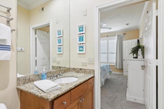 bathroom featuring vanity and crown molding