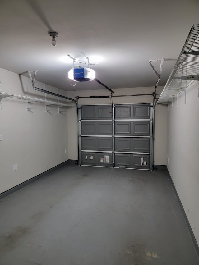 garage featuring a garage door opener