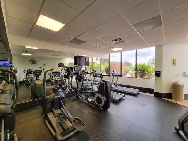 gym with a drop ceiling