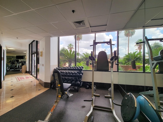 gym with a drop ceiling