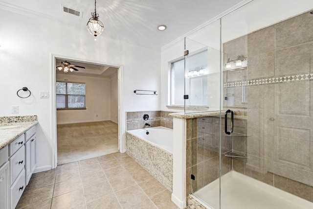 bathroom featuring vanity, crown molding, separate shower and tub, and tile patterned flooring