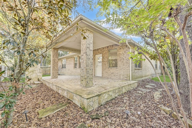 rear view of property with a patio