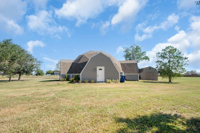 exterior space with a shed