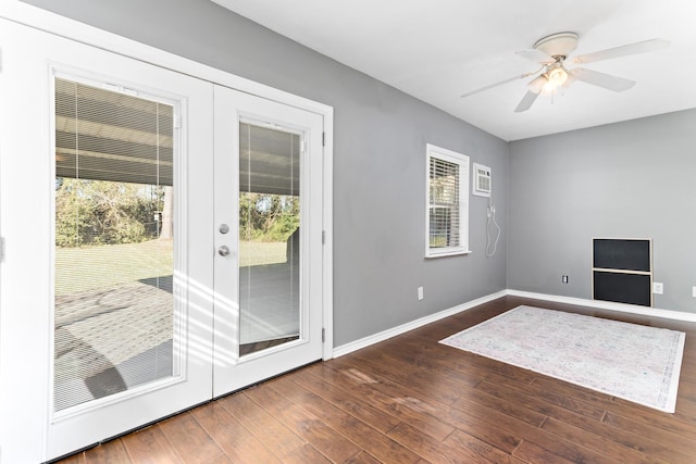 entryway with ceiling fan, dark hardwood / wood-style flooring, and french doors