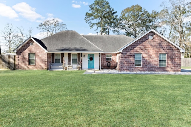 ranch-style house with a front lawn and a porch