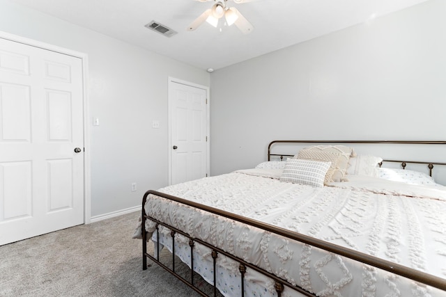 carpeted bedroom with ceiling fan