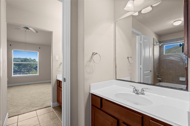 bathroom with vanity, ceiling fan, bathtub / shower combination, and tile patterned floors