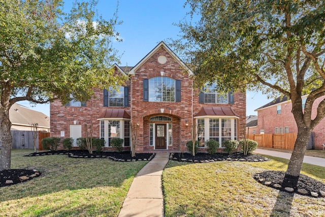 front of property featuring a front lawn