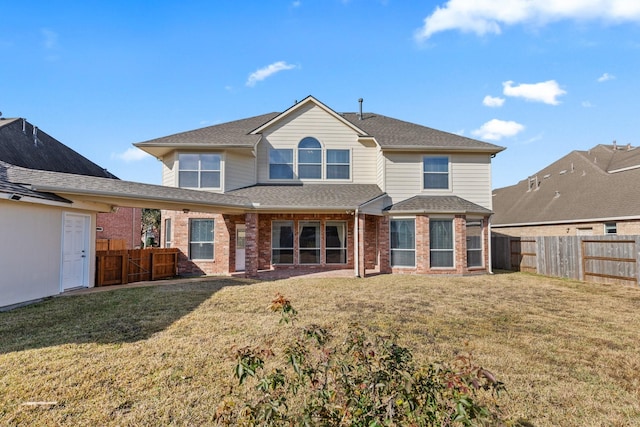 2511 Orchid Creek Dr, Pearland, TX 77584 - rear view of property with brick siding, a fenced backyard, and roof with shingles