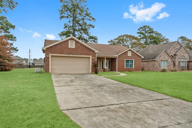 view of front facade with a garage and a front yard