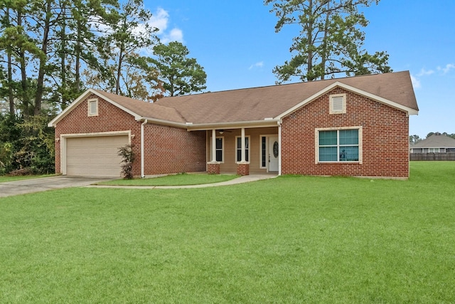 ranch-style home with a garage and a front lawn