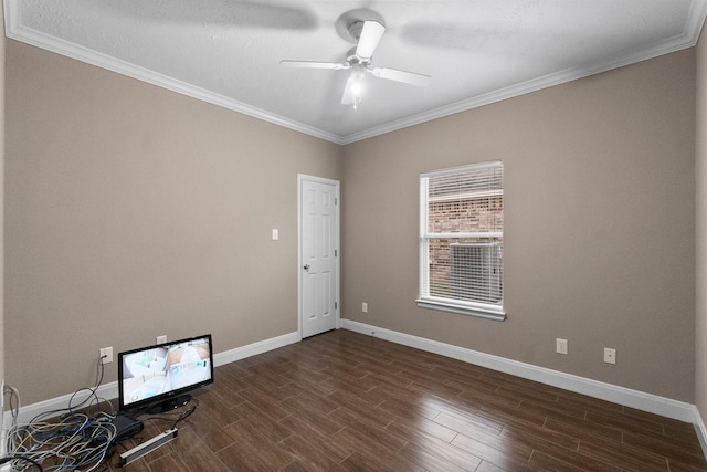 unfurnished room with ceiling fan and ornamental molding