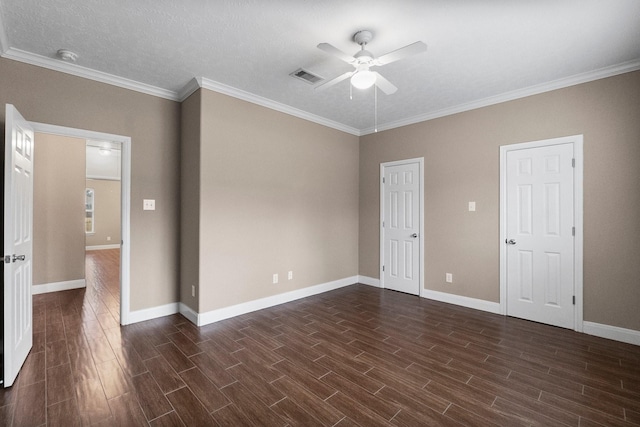 spare room with crown molding, a textured ceiling, and ceiling fan