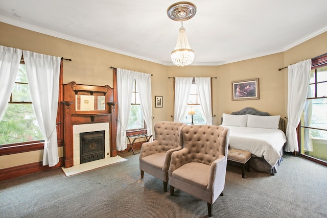 carpeted bedroom with a notable chandelier, ornamental molding, and multiple windows