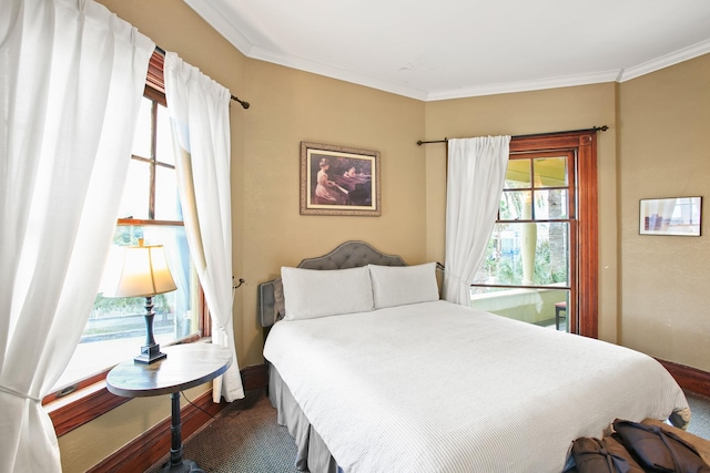 bedroom with crown molding