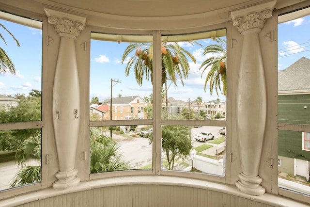 entryway featuring decorative columns