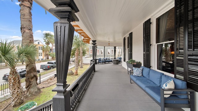 view of patio / terrace featuring an outdoor living space and a porch