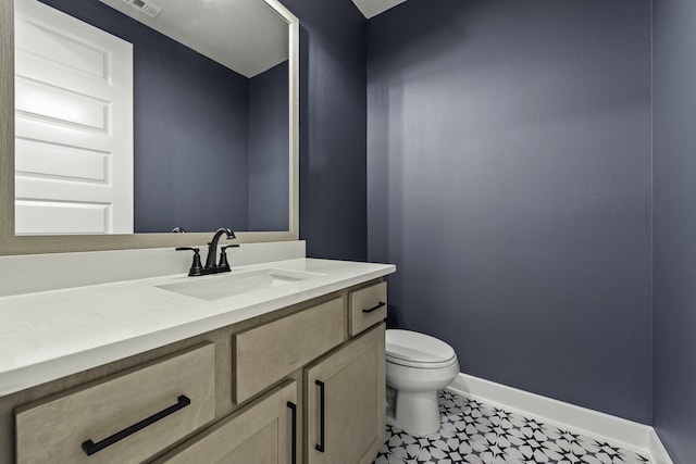 10807 Lighthouse Peak Trce, Richmond, TX 77406 - half bathroom with vanity, toilet, and baseboards