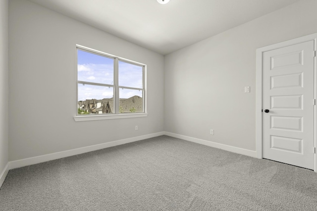 10807 Lighthouse Peak Trce, Richmond, TX 77406 - carpeted spare room with baseboards