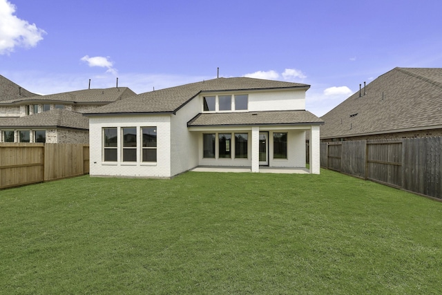 10807 Lighthouse Peak Trce, Richmond, TX 77406 - rear view of house with a patio and a shingled roof