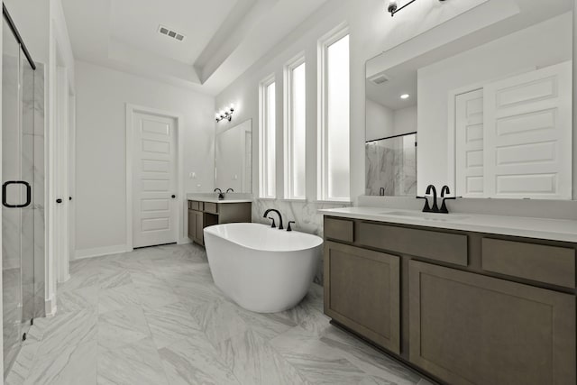 26515 Castra Crescent Trl, Richmond, TX 77406 - bathroom featuring a marble finish shower, marble finish flooring, two vanities, and a soaking tub