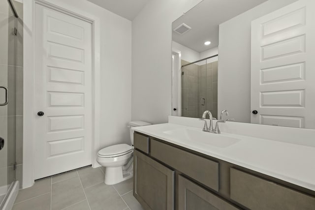26515 Castra Crescent Trl, Richmond, TX 77406 - bathroom featuring tile patterned floors, a shower stall, toilet, vanity, and recessed lighting