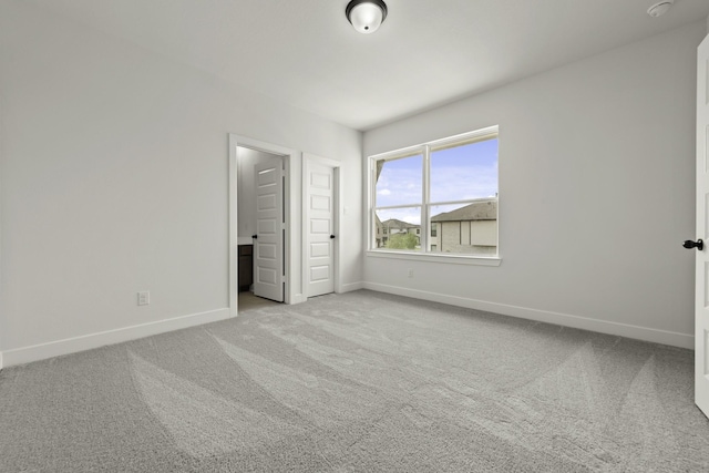 26515 Castra Crescent Trl, Richmond, TX 77406 - unfurnished bedroom featuring baseboards and carpet floors