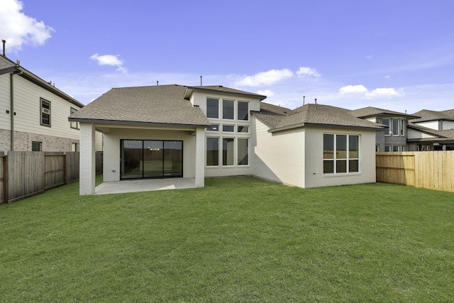 26515 Castra Crescent Trl, Richmond, TX 77406 - rear view of house with brick siding, a patio, and roof with shingles