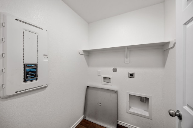 laundry area featuring hookup for a washing machine, hookup for a gas dryer, dark hardwood / wood-style flooring, and electric dryer hookup