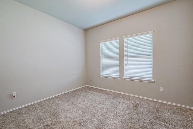 view of carpeted spare room