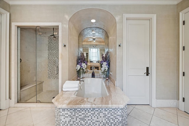 bathroom featuring separate shower and tub and tile patterned flooring