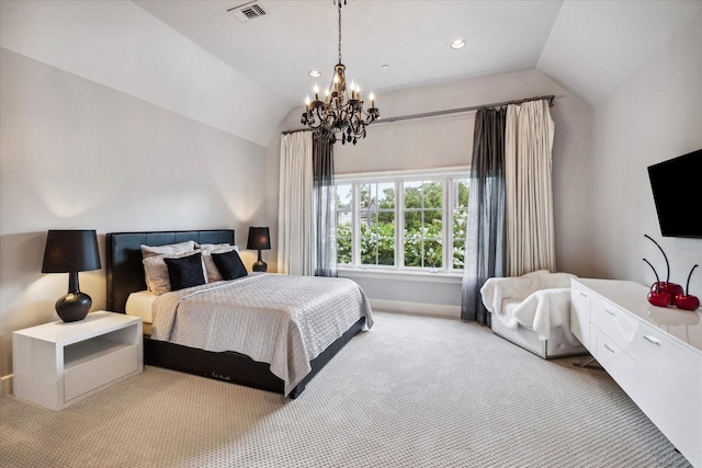 carpeted bedroom featuring an inviting chandelier and vaulted ceiling