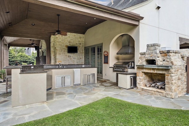 view of patio / terrace with a grill, ceiling fan, sink, and area for grilling